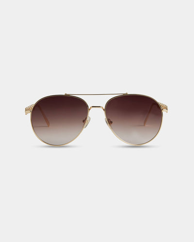 A pair of gold aviator sunglasses with brown gradient lenses and intricate embellishments on the temples, offering a stylish and sophisticated look with full sun protection.