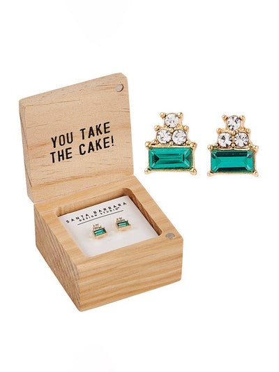 Open the Treasure Box Earrings - Happy Birthday! to unveil two dazzling earrings adorned with green rectangular stones and clear round stones on top. The inside of the lid displays the message, "You take the cake!"—a genuine Happy Birthday Edition gem.