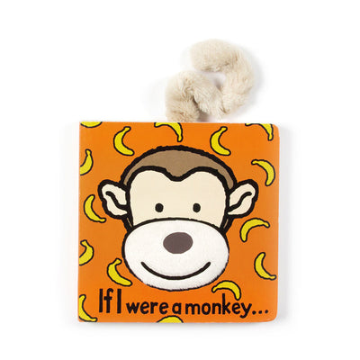 The Jellycat "If I Were a Monkey" children's board book is designed with an orange cover showcasing a smiling monkey face surrounded by bananas, making it an ideal nursery gift. The book features a furry tail attached at the top.