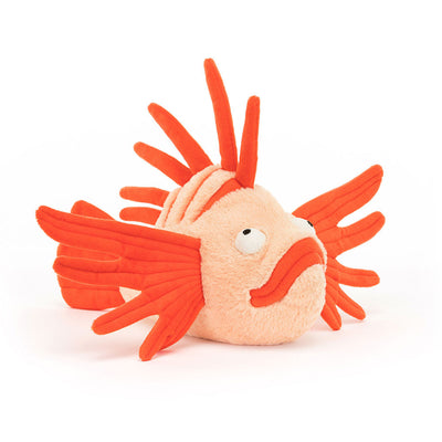 Front-facing Jellycat Lois Lionfish plush with wide eyes, a pouty orange mouth, and multiple layered fins along its sides and back